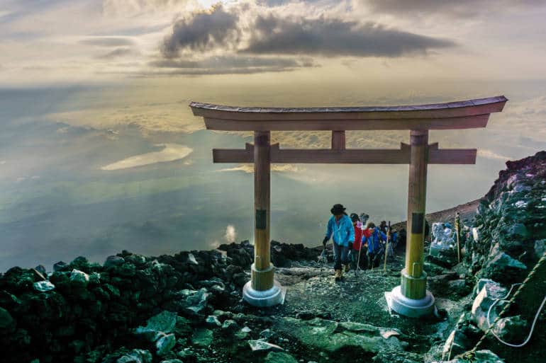 MOUNT FUJI, YAMANASHI, JAPAN - July 25, 2017 : Torii on top of Fuji mountain . Fuji is highest mountain in Japan at 3,776 m, symbol of Japan
